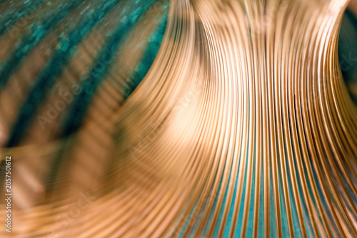 Close-up of shiny copper wires forming a dynamic abstract pattern. High-resolution tech background suitable for modern corporate layouts, finance, and industrial concepts. Photo