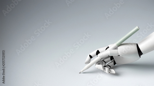Fotografía A white robotic hand elegantly holding a pen against a clean gray background