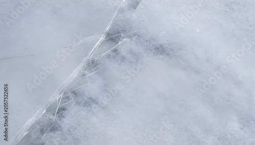 Abstract Ice Formations: A close-up shot reveals the intricate, abstract patterns of ice formations, with delicate crystalline structures catching the light in a cool, ethereal display.