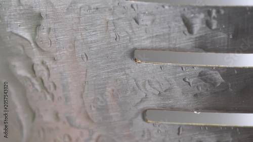4K video Fork Silhouette with Water Condensation. Kitchen Macro Texture Video. 