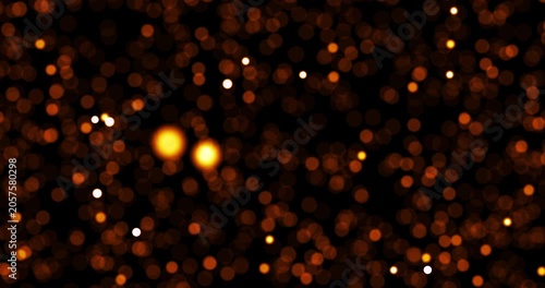 A mesmerizing video loop showcases soft bokeh light particles moving downwards rapidly. This abstract sparkling animation delivers a dreamy aesthetic atmosphere for creative projects.