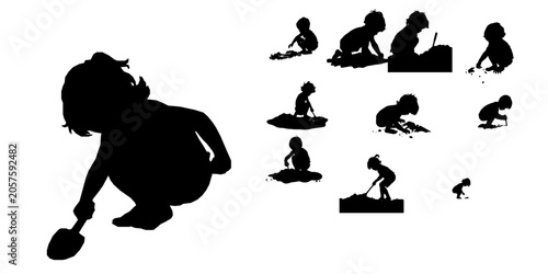 Child Digging in Sand Silhouette