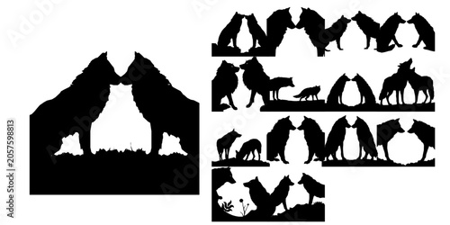 Schilderij op canvas Two Wolves Facing Each Other Silhouette