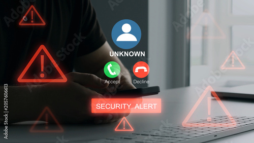 Scam call alert concept showing a suspicious incoming call on smartphone.Unknown Caller fraud risk and warning message highlight phishing, identity theft and the need for caution and digital security.