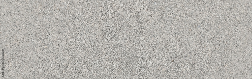 Fototapeta premium Light gray concrete texture background, industrial cement surface with fine grain, minimalist stone wall backdrop for architectural design