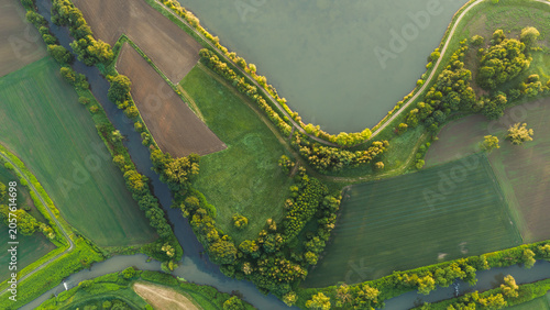 Photos Top down aerial view of the Ilownica river confluence into Vistula river surroun