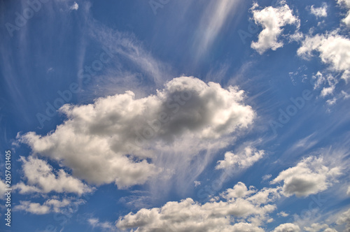 Blue sky with the presence of thin cloud formations
