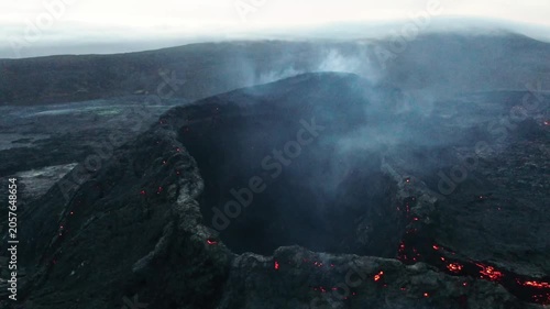 Aerial Drone View of Geldingadalir Volcano Crater with Glowing Lava Embers and Smoke at Night, Iceland