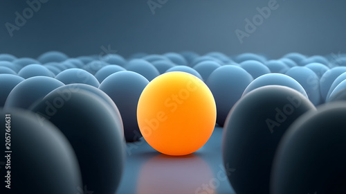 Single bright orange sphere standing out among many dark blue spheres