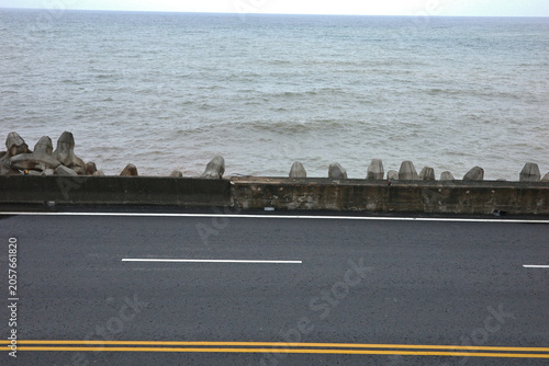 Coastal Road Along the Ocean with Calm Sea View