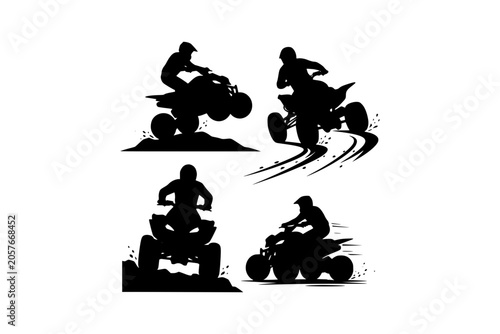 Silhouette of people riding ATV on trails