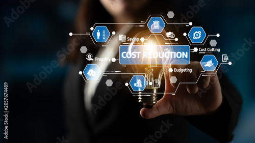 Quadro em tela A professional businesswoman highlights cost reduction concepts with light bulb icon, integrating themes of budgeting, savings, and efficiency for improved financial strategies
