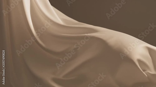 Flowing satin fabric in a soft beige or cream color with drapes and smooth, gentle folds creating a and serene visual texture with subtle highlights and shadows Keywords: fabric, satin, silk