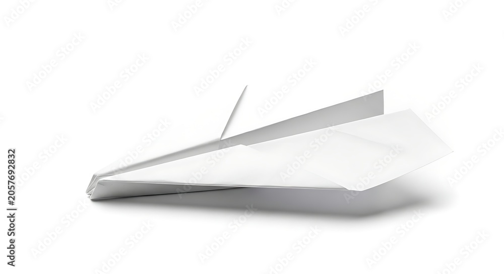 Naklejka premium A silver paper airplane soars through the air with precision and skill.