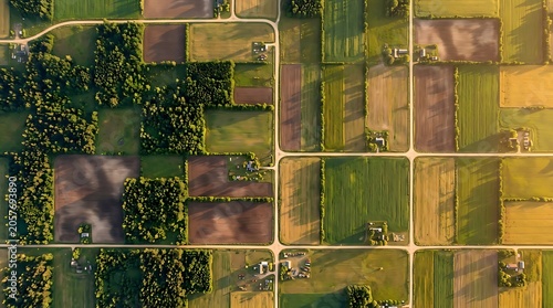 Top Down Drone Landscape Showing Mosaic Pattern of Farmland and Forest from Above