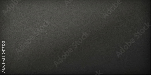 Fotografie A simple, dark gray textured background provides a neutral and versatile canvas for design projects