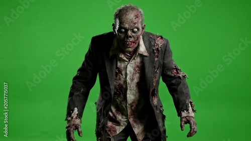 Terrifying Zombie Slowly Walking Toward Camera on Green Screen Background