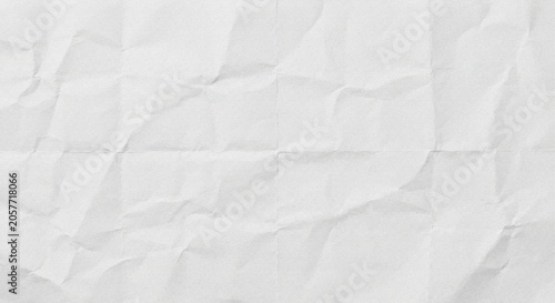 Crinkled white paper texture, a full-frame close-up background.