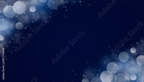 Sparkling blue bokeh background with glowing light effects