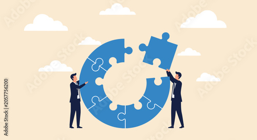 Foto Two business people assembling last piece of jigsaw puzzle to complete a circle, concept of teamwork and problem solving