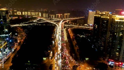 Aerial Night View of Busy City Highway Interchange and Traffic