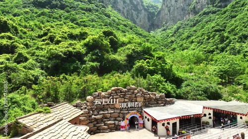 Yunqiu Mountain Ice Cave Scenic Area Entrance Beneath Green Cliffs in Shanxi China in Yunqiu Mountain, Shanxi, China