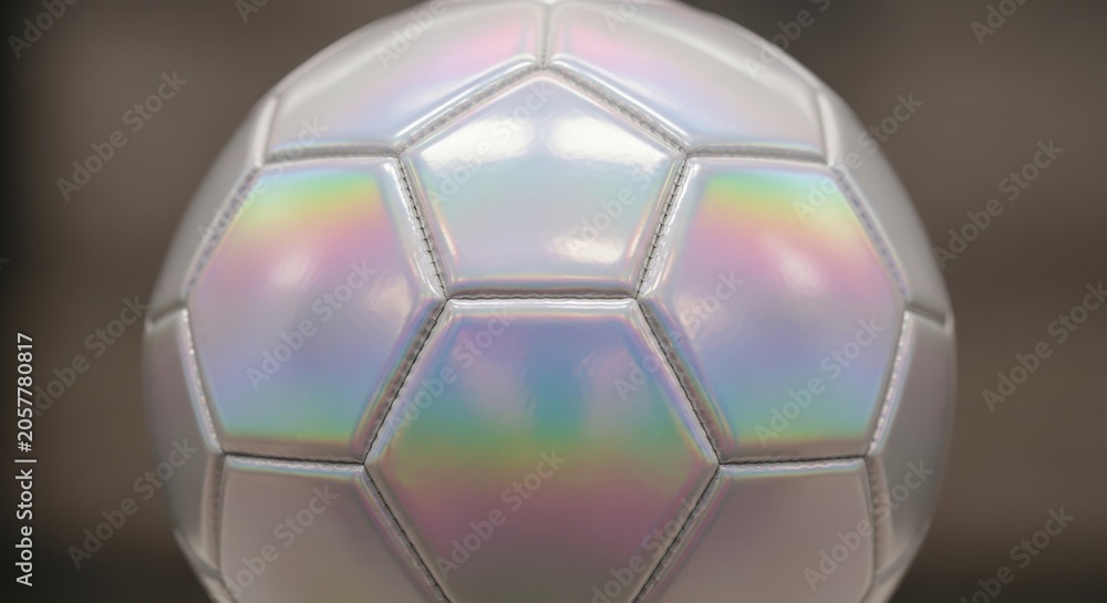 Naklejka premium Close-up Holographic Foil Soccer Ball with Rainbow Reflective Surface and Hexagonal Pattern