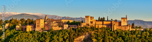 Panoramic view of the Alhambra with Sierra Nevada in the background taken from the famous Mirador de San Nicolás, Granada, Andalusia, Spain.