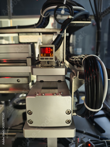 Industrial machine cable bundle metal equipment control unit digital display technical device manufacturing process mechanical part wired system automation technology