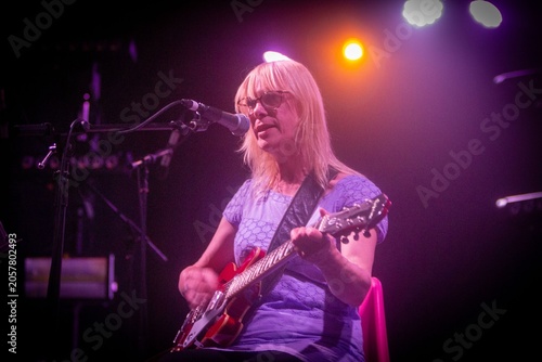 young woman playing guitar