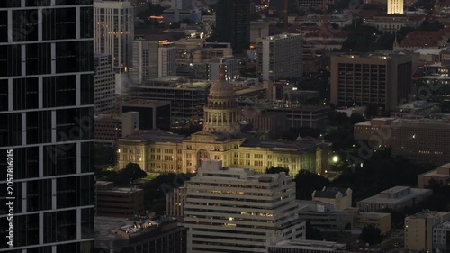 Aerial Texas State Capitol at Night Downtown Austin Reveal from Waterline Tower