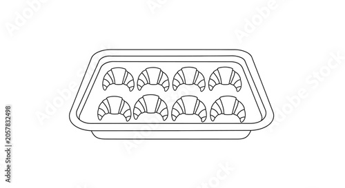 Freshly baked croissants in a rectangular tray.