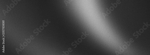 Minimalist abstract background with grainy texture and soft white glowing light beam against dark neutral gray surface for professional design work.