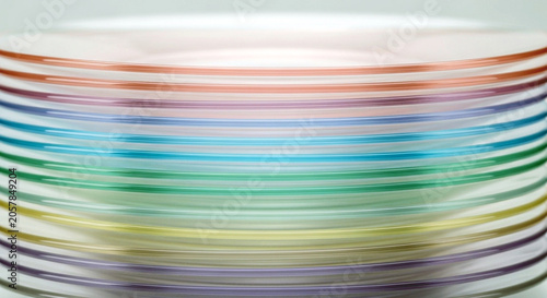 Stack of colorful translucent glass plates