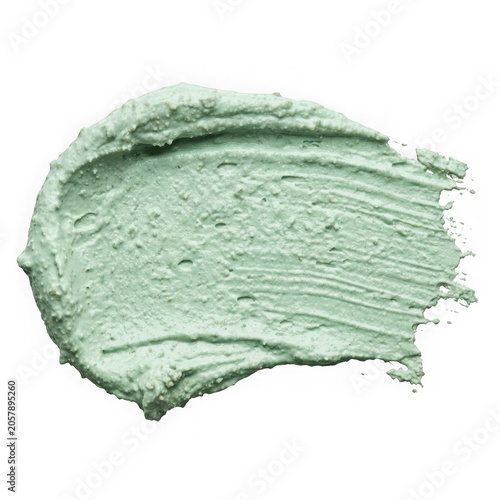 Light green cosmetic face mask smear texture
