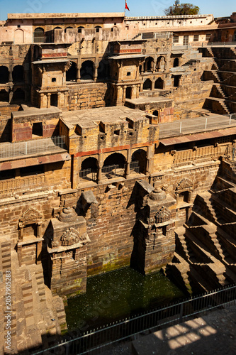 Chand Baori, a stepwell situated in the village of Abhaneri in the Indian state of Rajasthan..