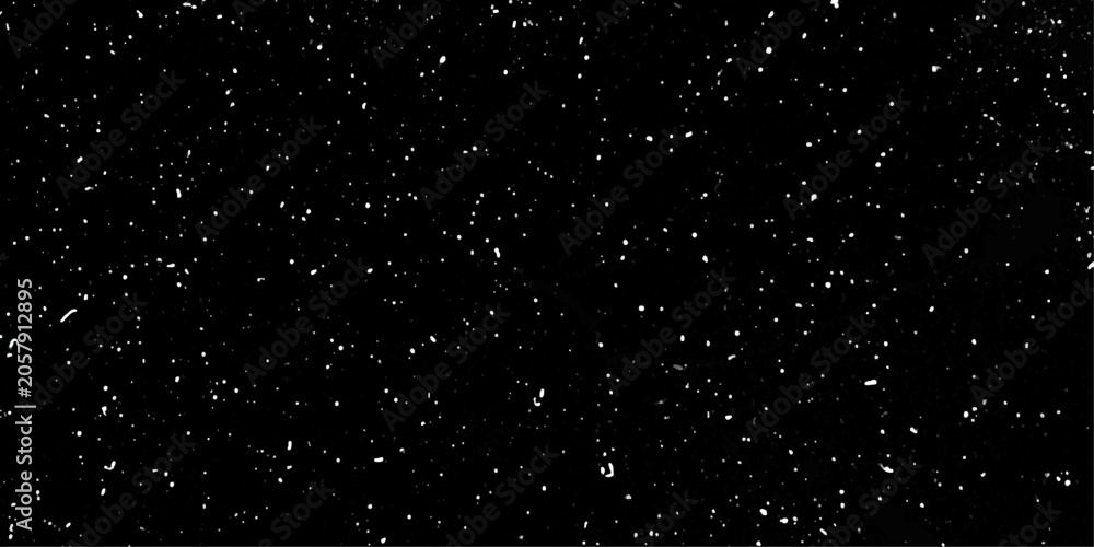 Obraz premium snow flakes falling down. Snowflakes gently falling against a dark night sky creating a serene winter atmosphere. Glowing stars in space. 