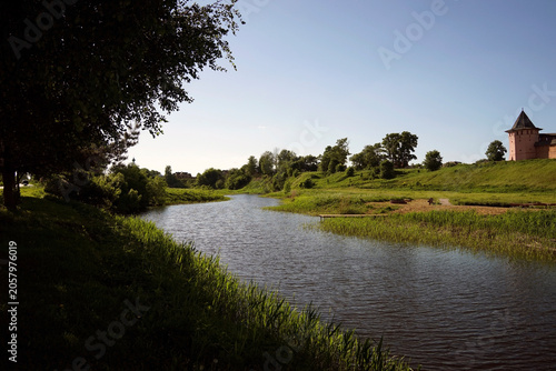 A scenic view of the river. Selected focus.The banks of a quiet river in summer are a great place for relaxation, fishing, finding peace of mind, and rejuvenation. Kamenka River in Suzdal, Vladimir Re