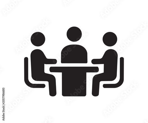Four people sitting around a table black flat icon on a white background representing teamwork and collaboration
