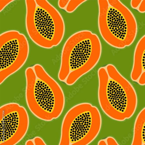Pattern of Papaya Slices on Green Background Showing Seeds and Vibrant Colors