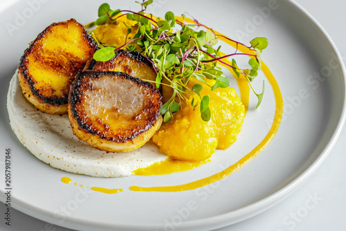 Seared Foie Gras on Corn Arepa with Plantain Puree and Microgreens