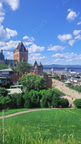 Famous Chateau Frontenac hotel and Dufferin Terrace in Quebec City on a sunny summer day