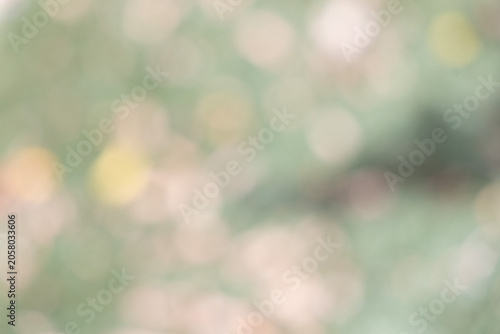 Фотография Abstract Green Bokeh Light Background with Soft Blurred Glow and Nature-Inspired