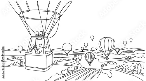 Obraz na płótnie A continuous line drawing of a hot air balloon carrying passengers