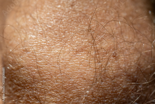 Macro shot of human skin and hair detail