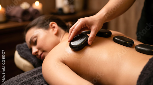 Relaxing Hot Stone Massage Warm Spa Setting