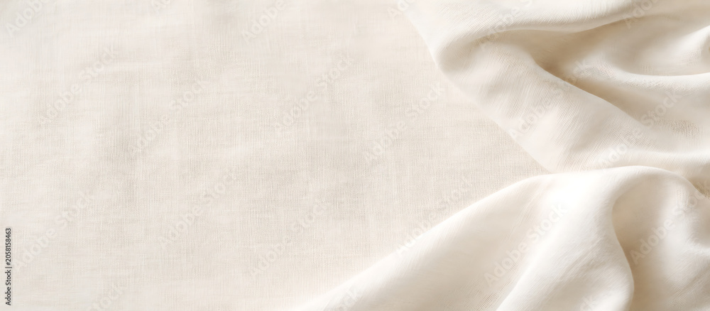 Fototapeta premium White linen fabric background with soft drapery folds and natural textile texture.