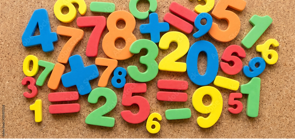 Fototapeta premium Colorful wooden math symbols, numbers and equations, educational alphabet, learning tools