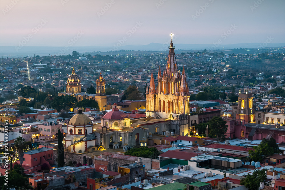 Naklejka premium Aerial view of the San Miguel Cathedral in Mexico City at night.