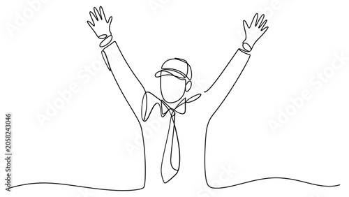 Businessman celebrates with arms raised in triumph
